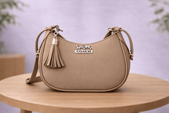 Greige Coach Hobo Bag – Leather with Tassel Accent